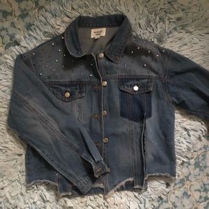 Denim jean jacket with spiked shoulders